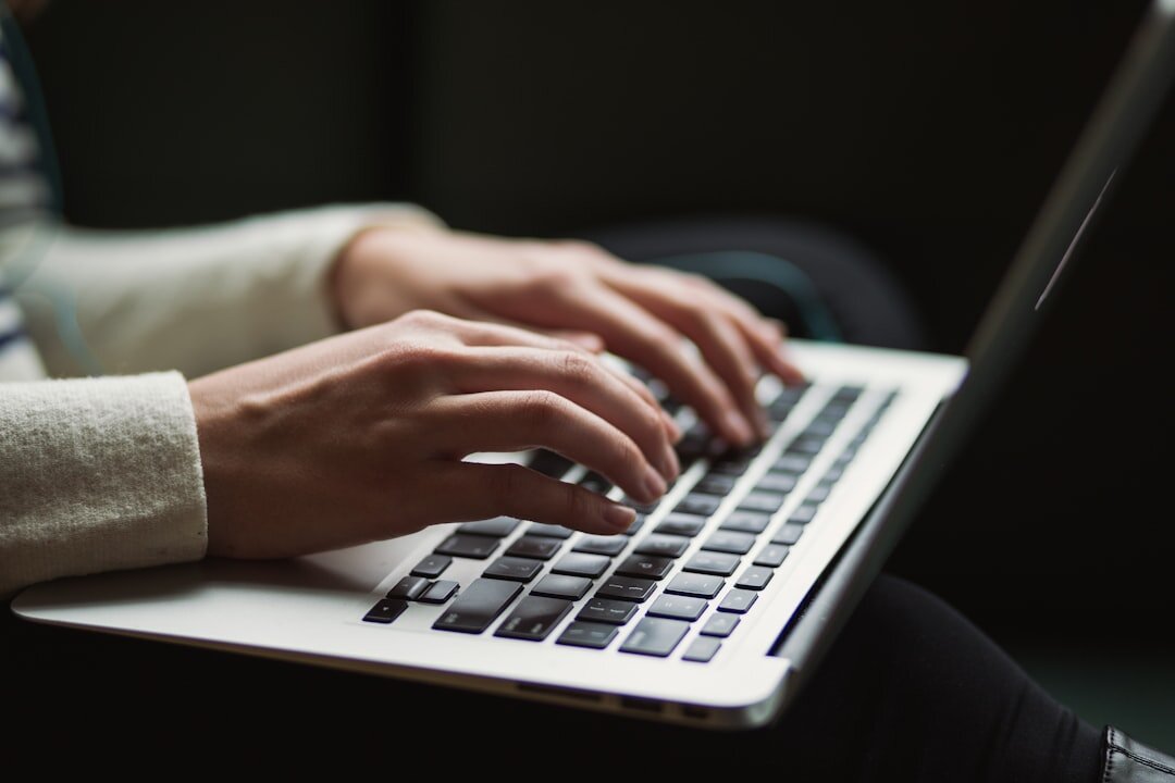 person checking facts on laptop